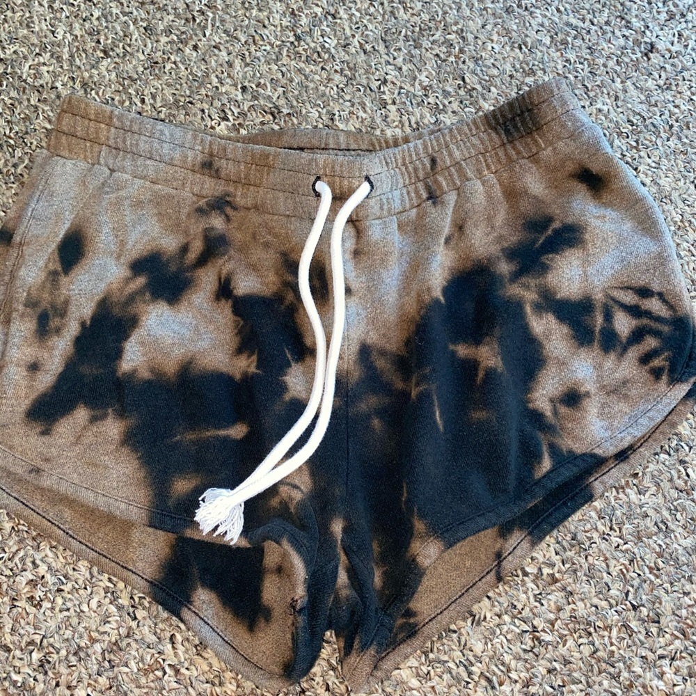Homemade bleached tie dyed juniors shirts
